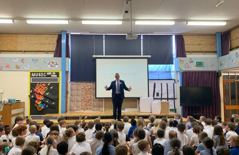 Sir Bernard giving assembly at Broomsgrove school